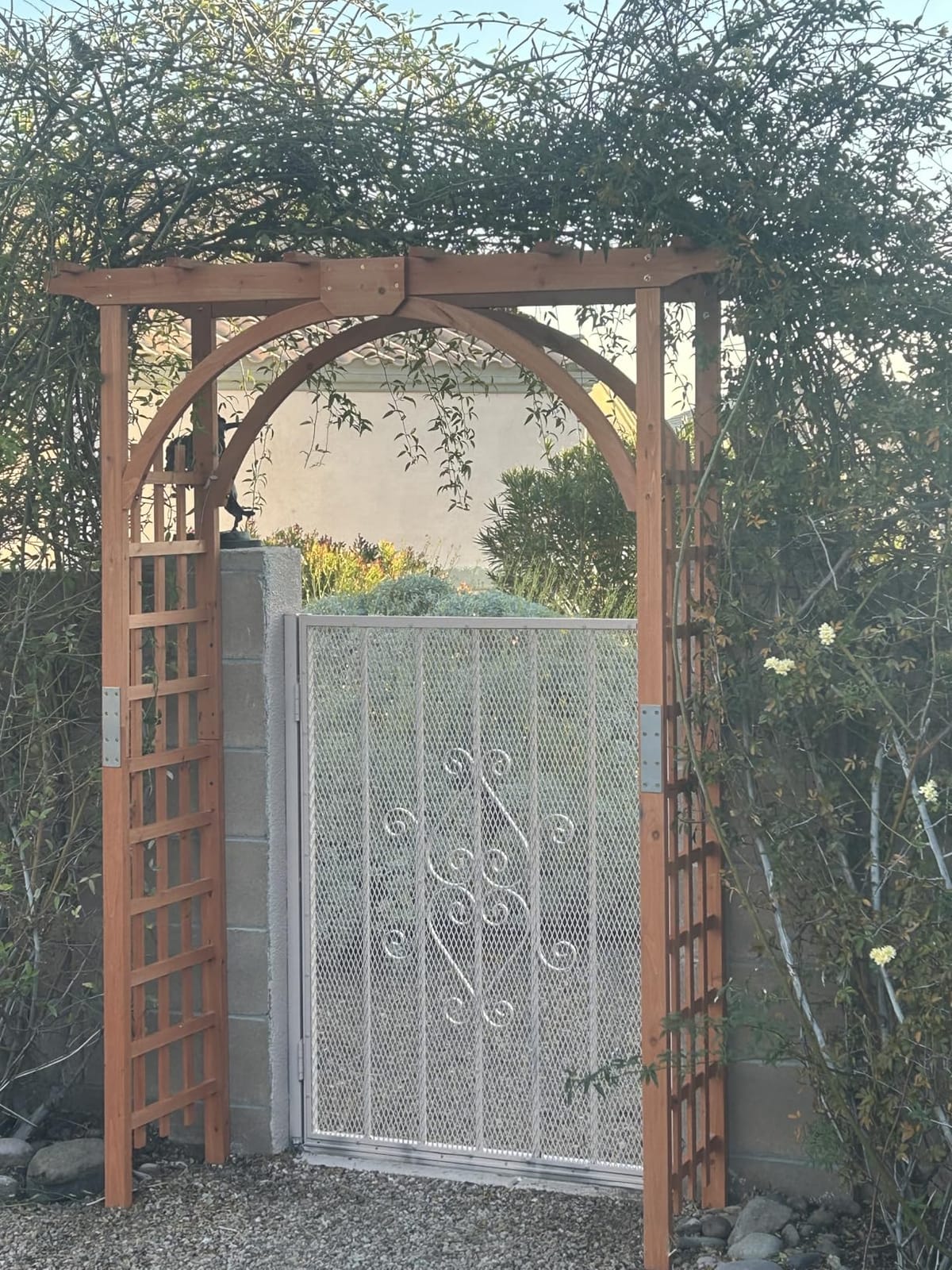 Yaheetech 85in Wooden Garden Arch Arbor Trellis for Backyard Patio Outdoor | Metal-reinforced fir wood arch with lattice sides supports climbing roses, wisteria, and vines as a walk-through entrance. customer photo 1