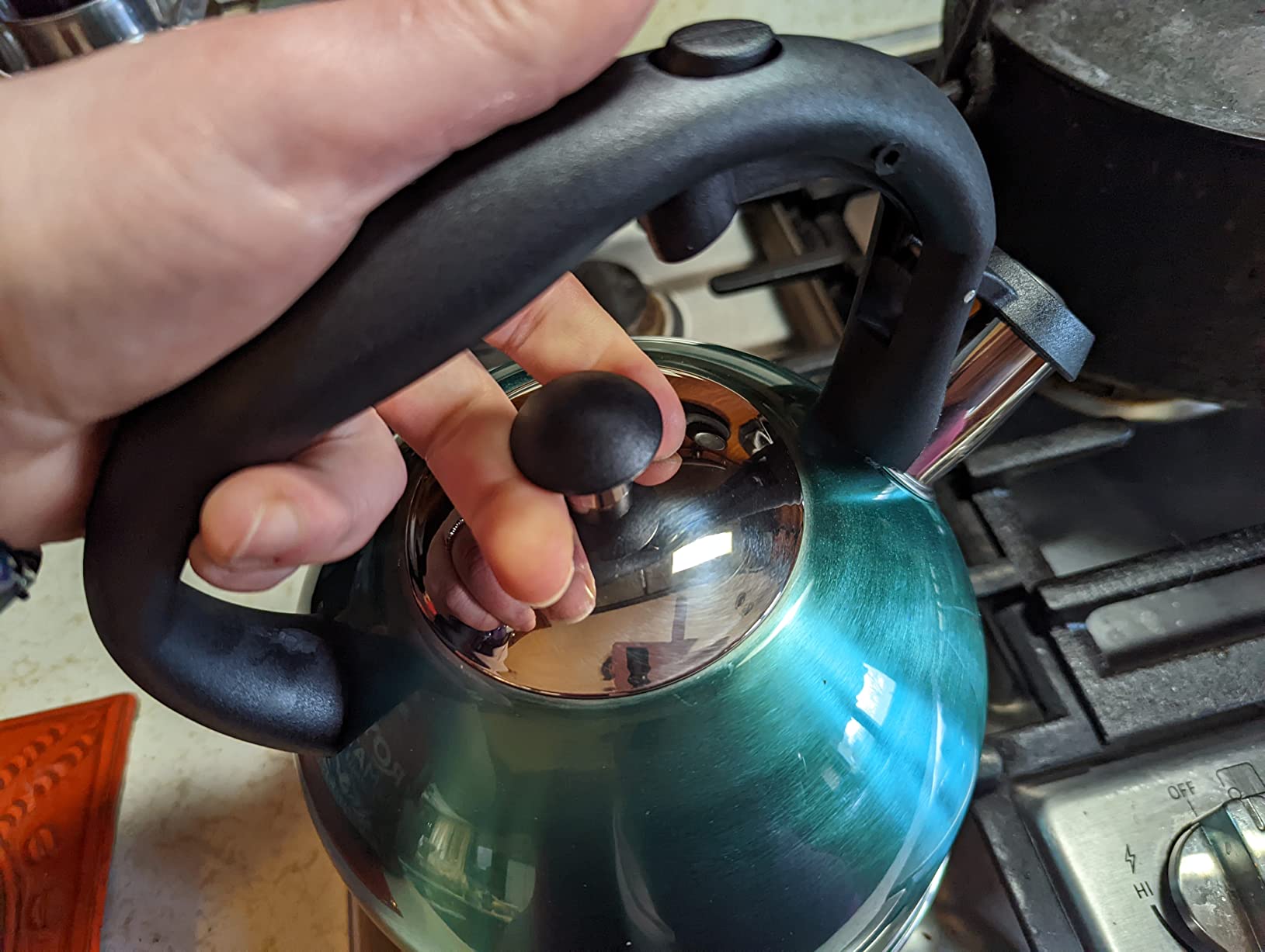 Amazon Basics Stovetop Whistling Tea Kettle, Fast Boiling, Stainless Steel, Food Grade, Ergonomic Handle, 2.3 Liter, Teal customer photo 1