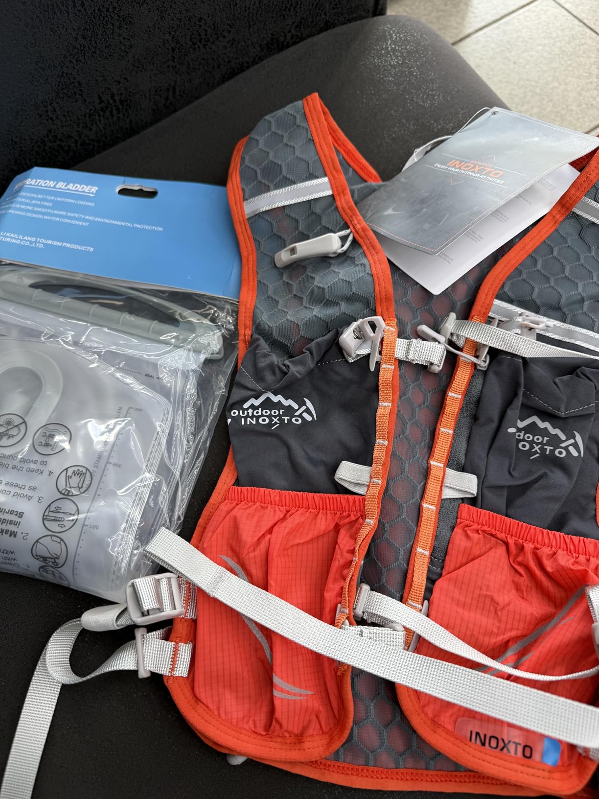 INOXTO Running Hydration Vest Backpack,Lightweight Insulated Pack with 1.5L Water Bladder Bag Daypack for Trail Hiking Running Cycling Race Marathon for Women Men customer photo 2