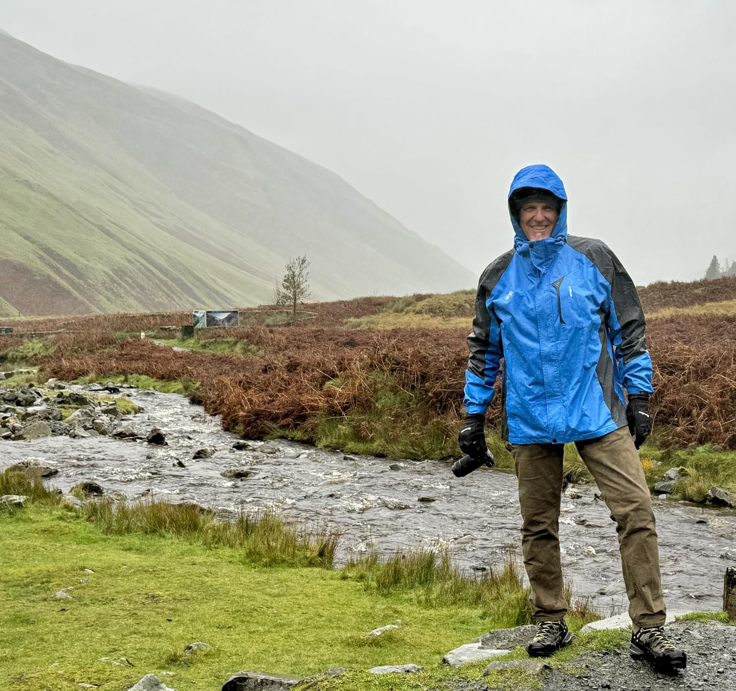 TEZO Mens Rain Jacket Waterproof with Hooded Hiking Coat Lightweight Windbreaker customer photo 2