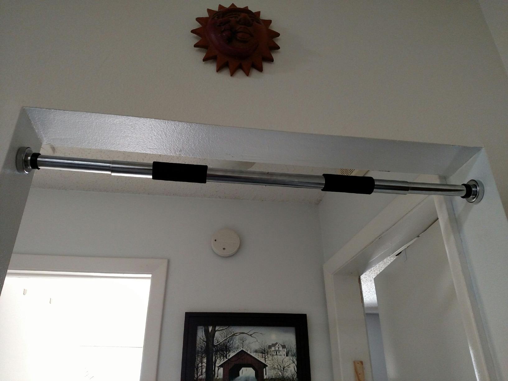 Sunny Health & Fitness Adjustable Doorway Chin Up/Pull Up Bar | Adjustable Doorway Fitment, Strong Steel Frame, Foam Padded Handlebars, Anti-Slip Pads, Ideal for Upper Body Workouts customer photo 2